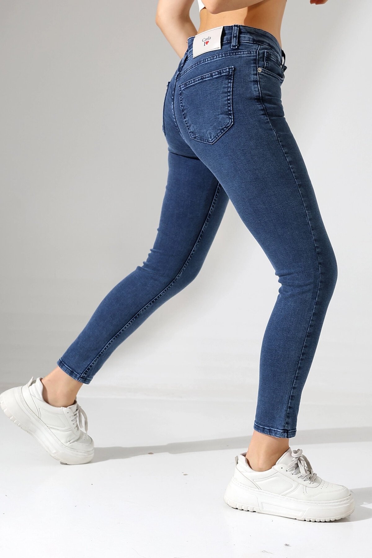 Toparlayıcı Yüksek Bel Dar Paça Jean