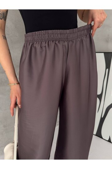 Saten Dokulu Lastik Paça Detaylı Yüksek Bel Bol Pantolon